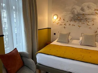 Un ou plusieurs lits dans un hébergement de l'établissement Le Grand Hôtel Mont Dore