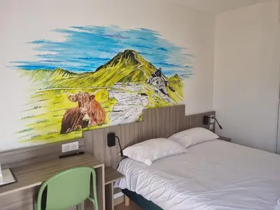 Un ou plusieurs lits dans un hébergement de l'établissement The Originals Access, Hôtel Le Lutéa