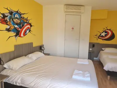 Un ou plusieurs lits dans un hébergement de l'établissement The Originals Access, Hôtel Le Lutéa