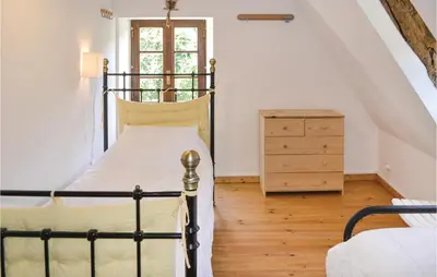 Un ou plusieurs lits dans un hébergement de l'établissement 2 Bedroom Awesome Home In Padirac