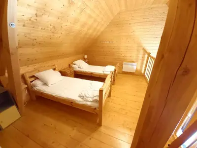 Un ou plusieurs lits dans un hébergement de l'établissement Chalet Sancy