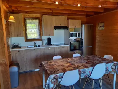 Cuisine ou kitchenette dans l'établissement Chalet Sancy