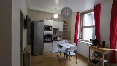 Cuisine ou kitchenette dans l'établissement Les Volcans de Valériane