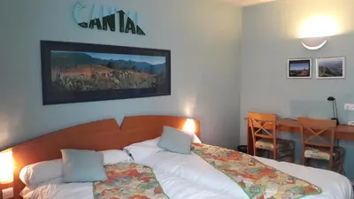 Un ou plusieurs lits dans un hébergement de l'établissement Hotel Le Saint Georges
