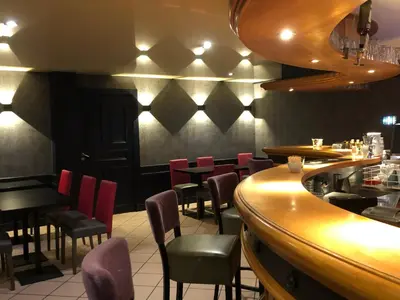 Restaurant ou autre lieu de restauration dans l'établissement Hotel Des Voyageurs
