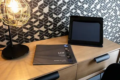 Télévision ou salle de divertissement dans l'établissement Relais Amadourien