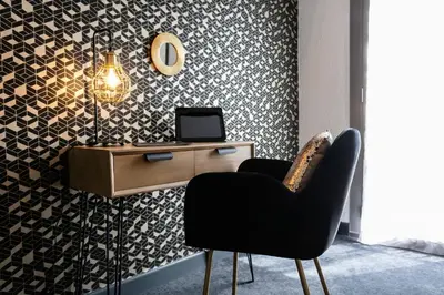 Télévision ou salle de divertissement dans l'établissement Relais Amadourien