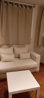Coin salon dans l'établissement Logis Hotel Grangier
