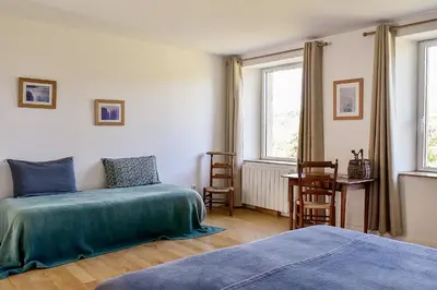 Un ou plusieurs lits dans un hébergement de l'établissement Chambre d'hôtes Chalendeix