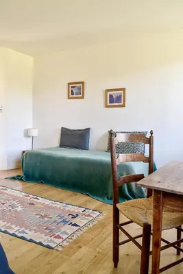 Coin salon dans l'établissement Chambre d'hôtes Chalendeix