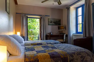 Un ou plusieurs lits dans un hébergement de l'établissement Auberge de Forgès