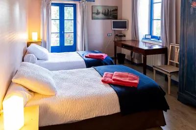 Un ou plusieurs lits dans un hébergement de l'établissement Auberge de Forgès
