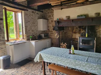 Cuisine ou kitchenette dans l'établissement Meublé de tourisme 