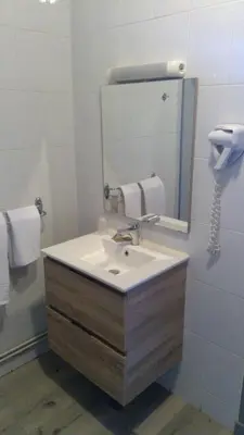 Salle de bains dans l'établissement Le Beauregard