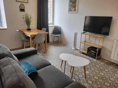 Télévision ou salle de divertissement dans l'établissement Résidence le 09