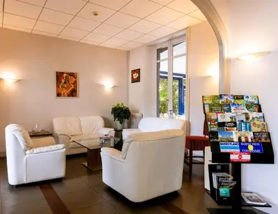 Coin salon dans l'établissement Le Sablier du Temps