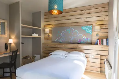 Un ou plusieurs lits dans un hébergement de l'établissement Hôtel de Russie