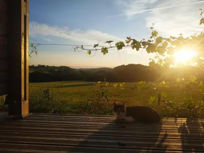 Lever ou coucher de soleil vu de la maison de vacances ou à proximité