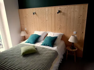 Un ou plusieurs lits dans un hébergement de l'établissement Le Pavillon