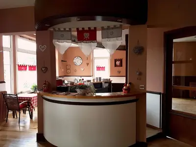 Cuisine ou kitchenette dans l'établissement Le Pavillon