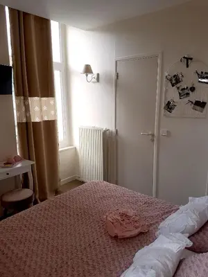 Un ou plusieurs lits dans un hébergement de l'établissement Le Pavillon