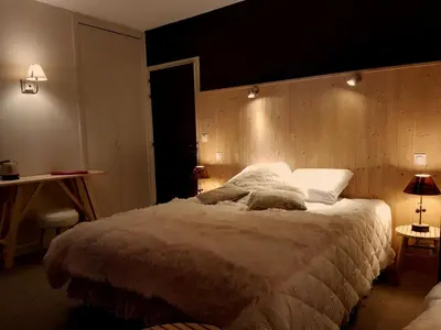 Un ou plusieurs lits dans un hébergement de l'établissement Le Pavillon