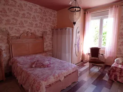 Un ou plusieurs lits dans un hébergement de l'établissement Beau Site Guimauve et Vieilles Dentelles