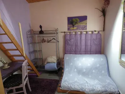 Un ou plusieurs lits dans un hébergement de l'établissement Beau Site Guimauve et Vieilles Dentelles