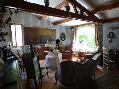 Coin salon dans l'établissement Beau Site Guimauve et Vieilles Dentelles