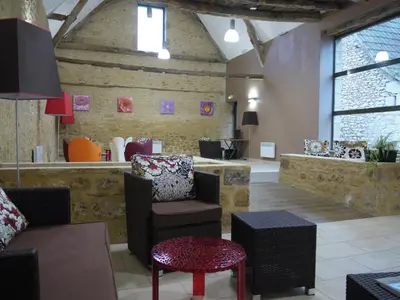 Coin salon dans l'établissement Lagrange Vacances Les Bastides de Lascaux