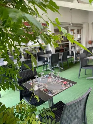 Restaurant ou autre lieu de restauration dans l'établissement Logis Hotel Noemys Brive - Restaurant Le Teinchurier