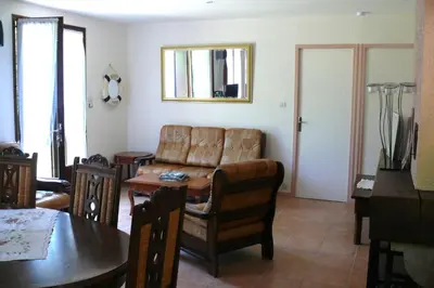 Coin salon dans l'établissement Maison Bord Du Lac