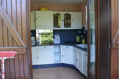 Cuisine ou kitchenette dans l'établissement Maison Bord Du Lac