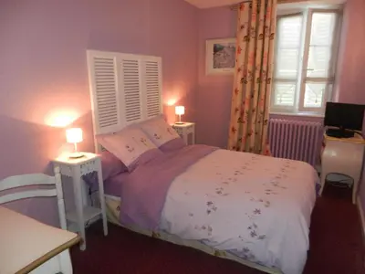 Un ou plusieurs lits dans un hébergement de l'établissement Auberge de la Tradition