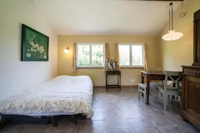 Un ou plusieurs lits dans un hébergement de l'établissement Studio à Deux au Blagour