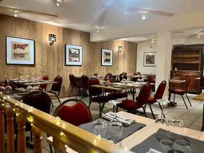 Coin salon dans l'établissement Hotel Restaurant Le Clos