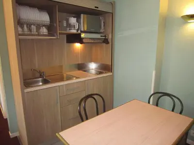 Cuisine ou kitchenette dans l'établissement Résidence Wilson