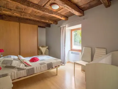 Un ou plusieurs lits dans un hébergement de l'établissement Holiday Home La Salesse by Interhome