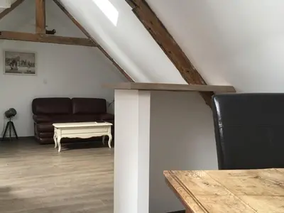 Coin salon dans l'établissement Appartement L'Arédien