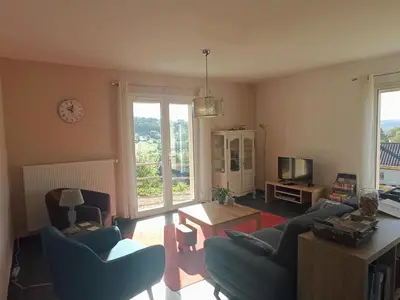 Coin salon dans l'établissement La Mirabelle 85m2 comfort et très jolie vue