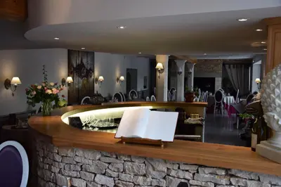 Coin salon dans l'établissement Le Petit Relais