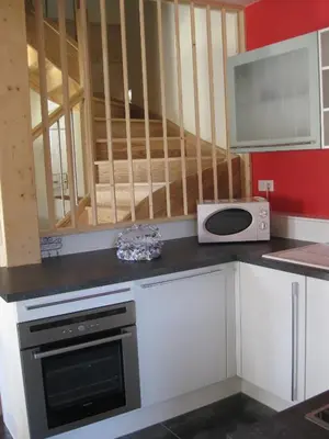 Cuisine ou kitchenette dans l'établissement La petite maison