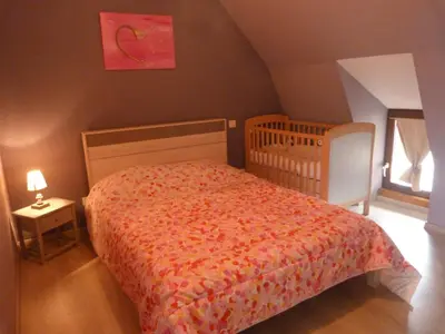 Un ou plusieurs lits dans un hébergement de l'établissement La petite maison