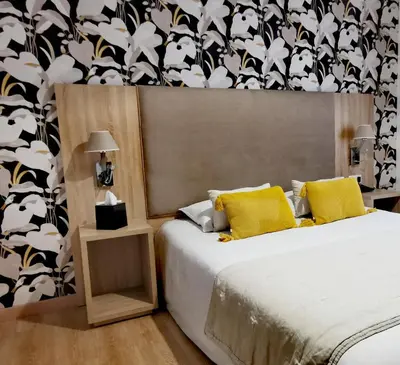 Un ou plusieurs lits dans un hébergement de l'établissement Grand Hôtel Brive