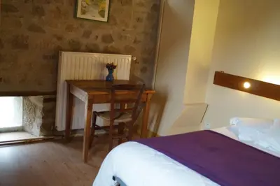 Un ou plusieurs lits dans un hébergement de l'établissement Gîte de 15 places en chambre de 2, 4, 5 personnes