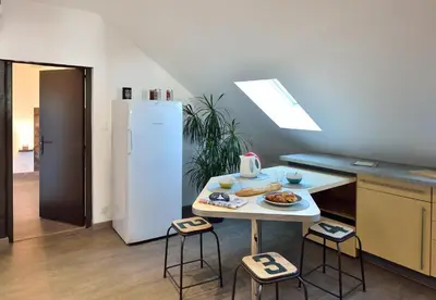 Cuisine ou kitchenette dans l'établissement Le Perchoir - 4 Personnes