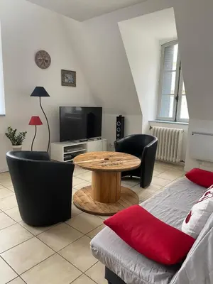 Télévision ou salle de divertissement dans l'établissement La bourboule Appartement