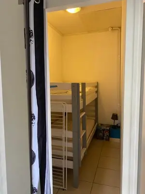 Un ou plusieurs lits dans un hébergement de l'établissement La bourboule Appartement