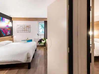 Un ou plusieurs lits dans un hébergement de l'établissement ibis Styles Brive Ouest