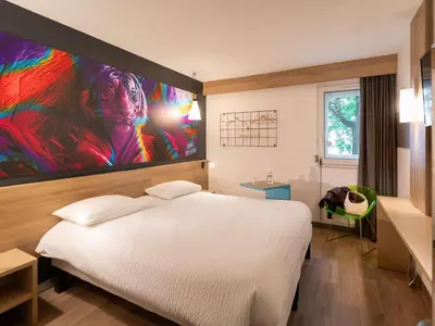 Un ou plusieurs lits dans un hébergement de l'établissement ibis Styles Brive Ouest